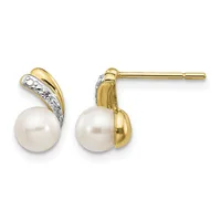 A pair of yellow gold stud earrings with white pearls and diamond accents, shown from the front and back views.