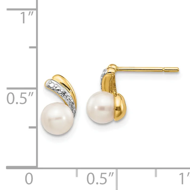Two gold stud earrings with white pearls and diamond accents, shown next to a ruler indicating approximately one inch in height.
