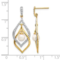 Two-tone gold and diamond drop earrings with pearl centers, featuring nested diamond-outlined teardrop shapes, displayed next to a measurement scale.