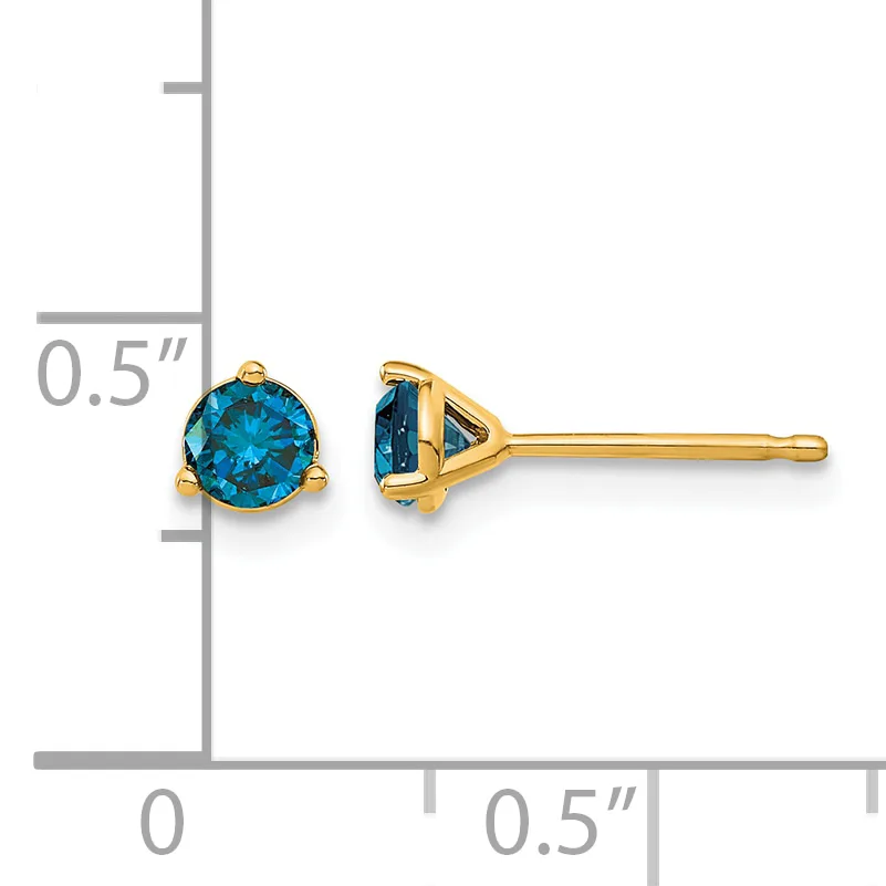 Pair of gold stud earrings with round blue gemstones in prong settings, shown against a measurement scale indicating approximately half-inch size.