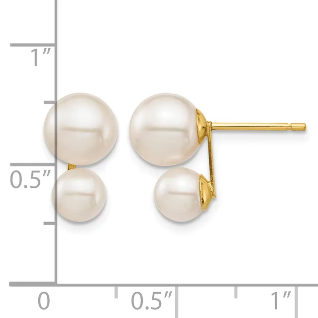 A pair of gold stud earrings with two pearl drops of different sizes on each post, displayed against a measurement scale.