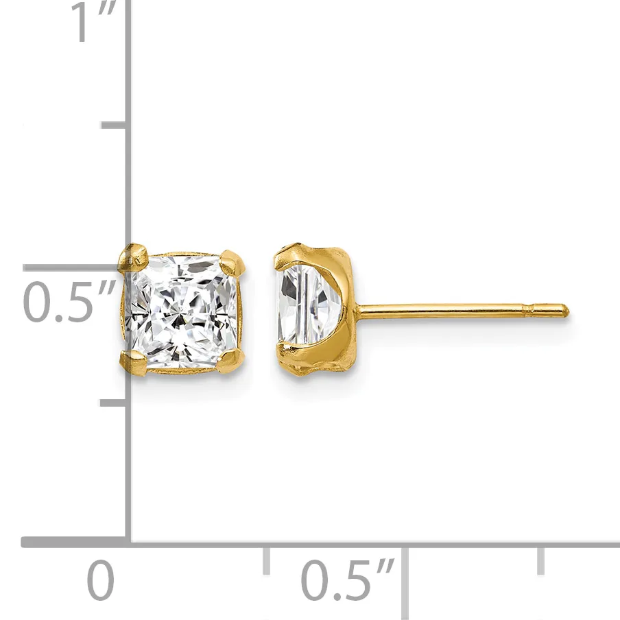 Pair of gold stud earrings with cushion-cut clear gemstones in four-prong settings, shown against a measurement scale.