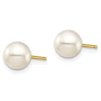 A pair of round white pearl stud earrings with gold posts on a white background.