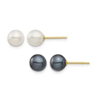 Two pairs of stud earrings with gold posts: one pair featuring white lustrous pearls and one pair featuring dark gray lustrous pearls, displayed against a white background.