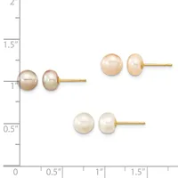Three pairs of pearl stud earrings in varying sizes displayed on a measurement scale, featuring white, champagne, and golden pearl spheres set in gold posts.
