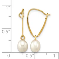 Pair of gold-toned hoop earrings with white pearl drops, displayed next to a ruler showing approximately one inch in length.
