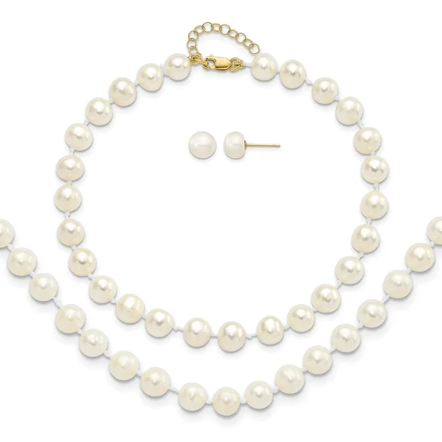 Two-strand pearl necklace with gold clasp and matching pearl stud earrings displayed on a white background.
