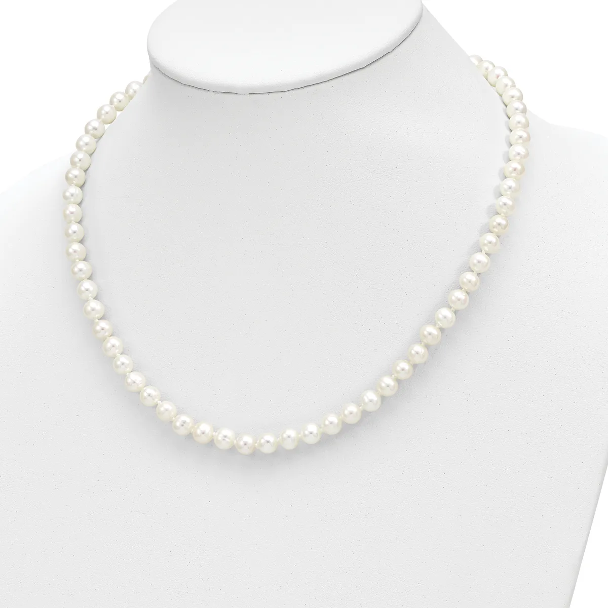 A strand of white pearls arranged in a continuous loop, displayed on a white mannequin bust against a white background.