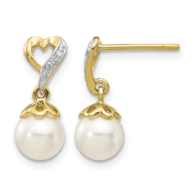 Pair of gold and diamond heart stud earrings with white pearl drops and small hallmarks on the posts.
