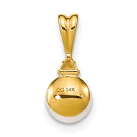 A gold pendant featuring a polished spherical ball with a white pearl or gemstone at the base, suspended from a decorative gold bail with a split heart-shaped top.