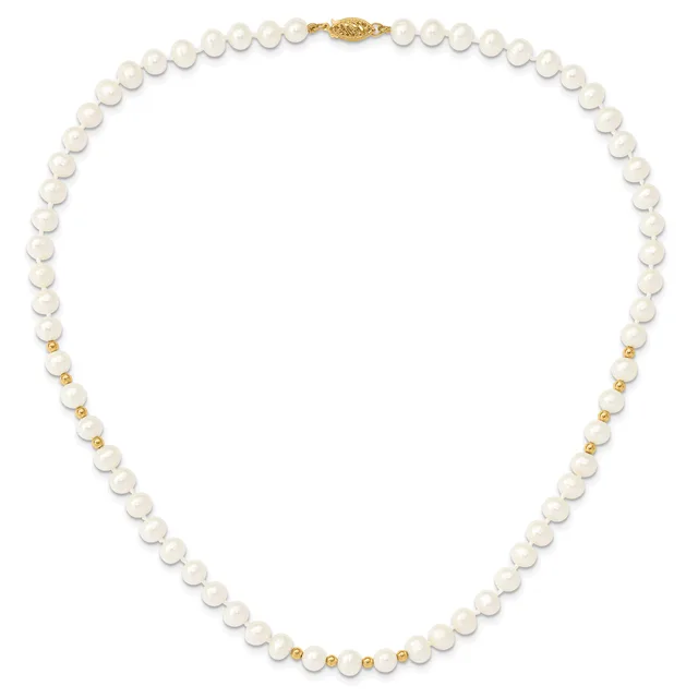A pearl necklace with white round pearls separated by small gold-tone beads, featuring a gold-tone clasp at the center top.
