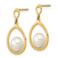 Pair of gold teardrop earrings with white pearl centers suspended from small looped posts.