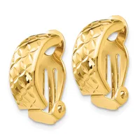 A pair of gold clip-on earrings with textured diamond-cut surfaces and curved leaf-shaped designs, shown from a three-quarter view.