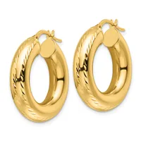 A pair of gold hoop earrings with a twisted texture on the outer surface and polished finish on the inner surface, shown against a white background.