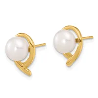 A pair of gold stud earrings, each featuring a white pearl set in a curved gold frame with a post backing, shown against a white background.