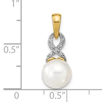 A two-tone pendant featuring a white pearl suspended below a twisted diamond-set loop, with a gold bail, displayed against a measurement scale.