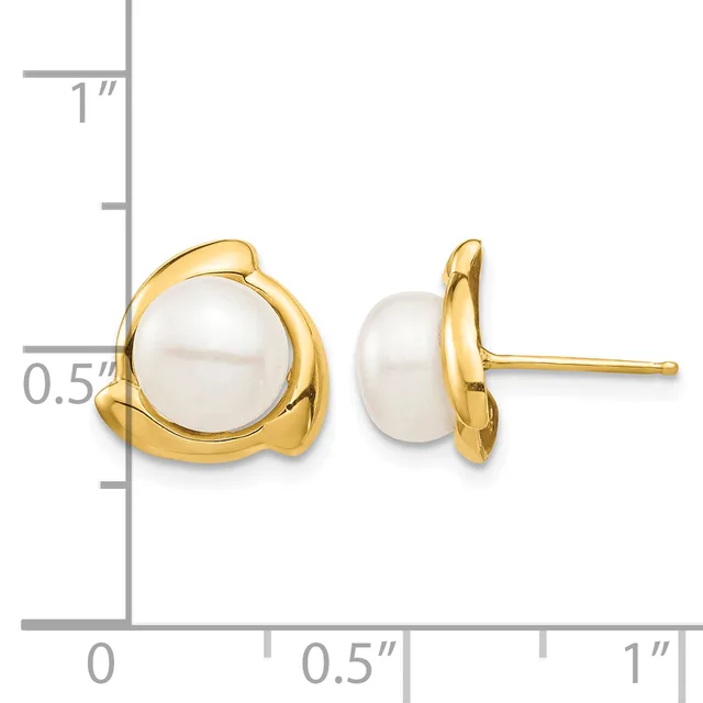 Pair of gold stud earrings with white pearl centers set in rounded gold bezels, shown next to a ruler for scale.