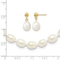 A gold-toned pearl jewelry set consisting of a bracelet with five oval white pearls connected by small beads, and matching drop earrings with round gold balls and teardrop pearls.