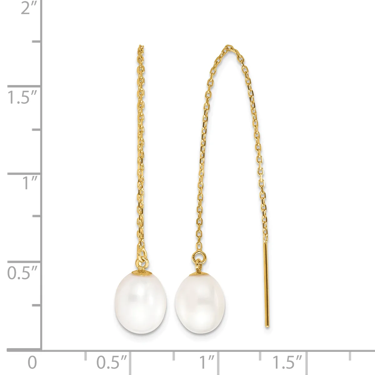 Two pairs of gold earrings with white pearl drops displayed against a ruler showing measurements up to two inches.