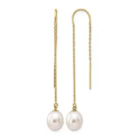 Pair of gold threader earrings with white pearl drops suspended from delicate chain links.