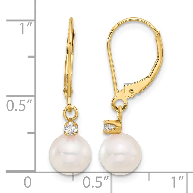 Gold lever-back earrings with round white pearls suspended below small diamond accents, displayed against a measurement ruler.
