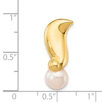 A gold curved pendant with a white pearl drop, shown next to a ruler indicating it is approximately one inch tall.