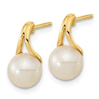 A pair of gold drop earrings with curved gold tops and round white pearl pendants, displayed against a white background.
