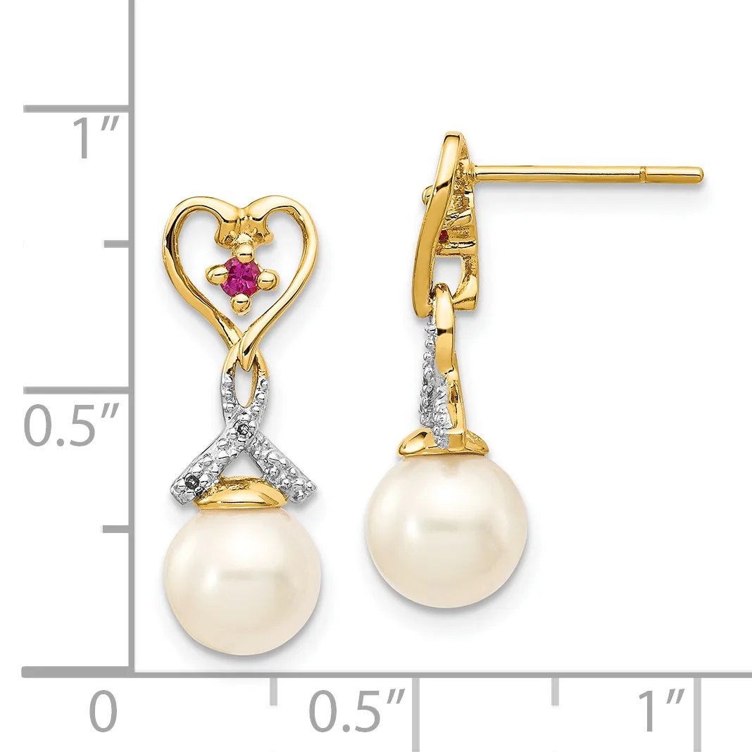 Pair of gold drop earrings with heart-shaped tops set with ruby and diamonds, suspended pearl bottoms, shown against a measurement scale.