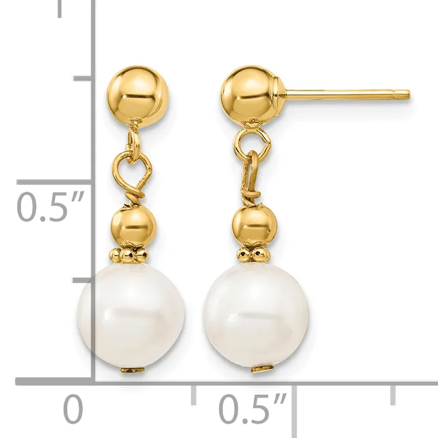 Pair of gold ball stud earrings with dangling pearl drops, shown next to a ruler indicating approximately half an inch in length.