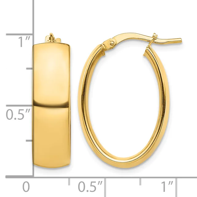 A pair of polished gold hoop earrings with a measurement scale showing approximately one inch in length and half an inch in width.