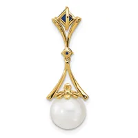Gold pendant featuring an ornamental top with geometric design suspended above a white pearl held in a decorative gold cage.