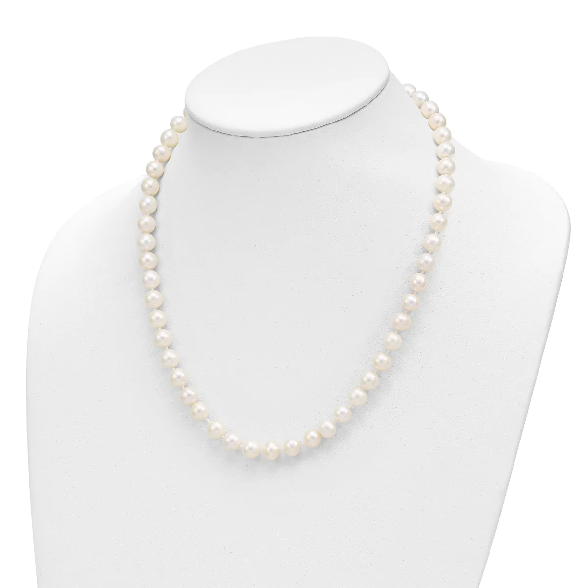 A strand of white pearl beads displayed on a white mannequin bust against a white background.