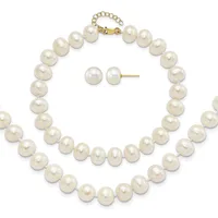 Two-strand cream pearl necklace with gold clasp and matching pearl stud earrings displayed on white background.