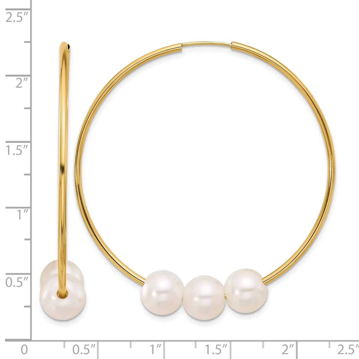 Gold-toned bangle bracelet with three white pearls at the bottom, shown open and displayed against a ruler measuring approximately 2.5 inches in height.