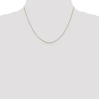A thin gold chain necklace displayed on a mannequin torso against a white background.