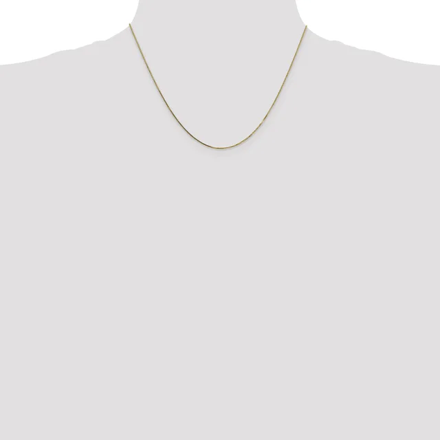 A thin gold-toned snake chain necklace displayed on a dress form mannequin against a white background.
