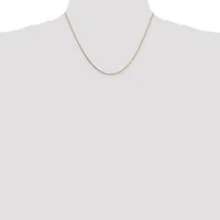 A thin gold-toned snake chain necklace displayed on a dress form mannequin against a white background.