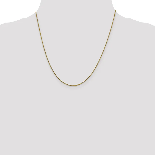 A thin gold-toned chain necklace displayed on a mannequin torso against a white background.