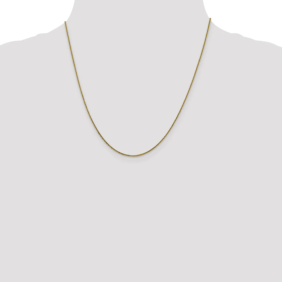 A thin gold-toned chain necklace displayed on a mannequin torso against a white background.