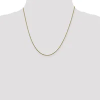 A thin gold-toned chain necklace displayed on a mannequin torso against a white background.
