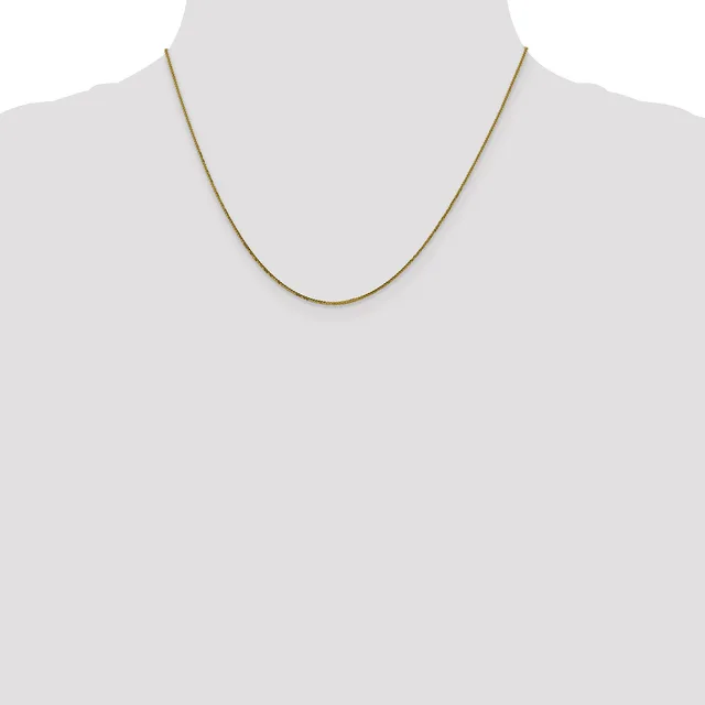 A thin gold-toned snake chain necklace displayed on a mannequin bust against a neutral background.