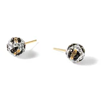 Pair of spherical stud earrings with gold posts, featuring a textured surface of black and white crystals or stones arranged in a spotted pattern.