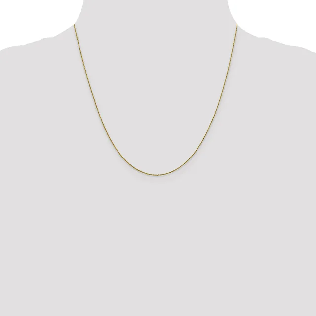A thin gold-toned chain necklace displayed on a mannequin bust against a white background.