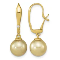 A pair of gold drop earrings with polished spherical pendants and matching lever backs, each featuring a small diamond accent on the upper post.