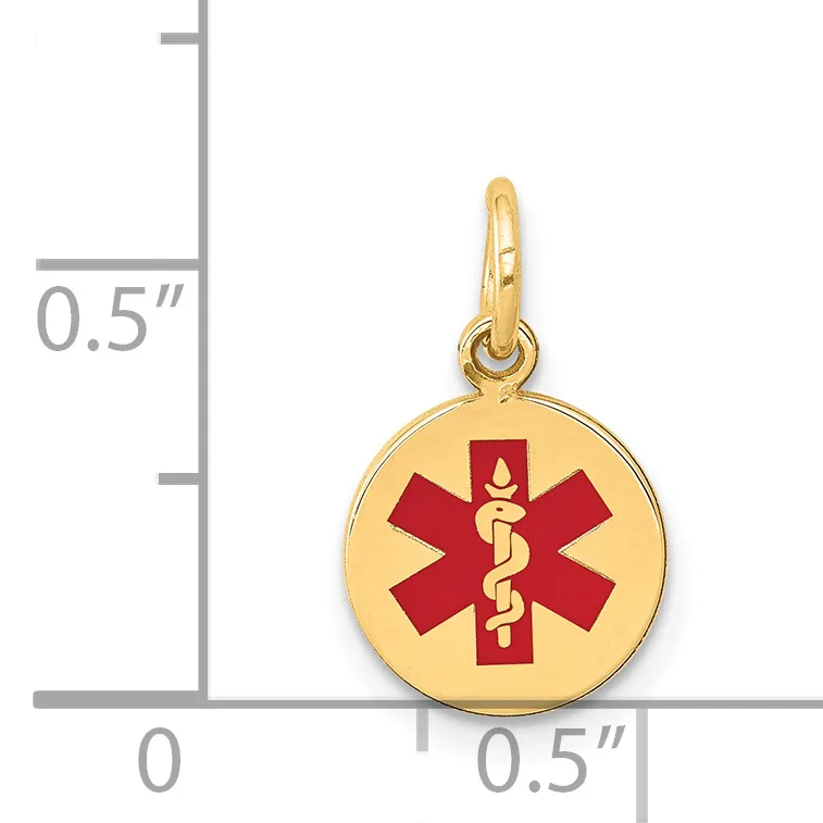 Gold-colored round medical alert pendant with red star of life symbol and snake staff, shown next to a ruler indicating approximately half-inch diameter.