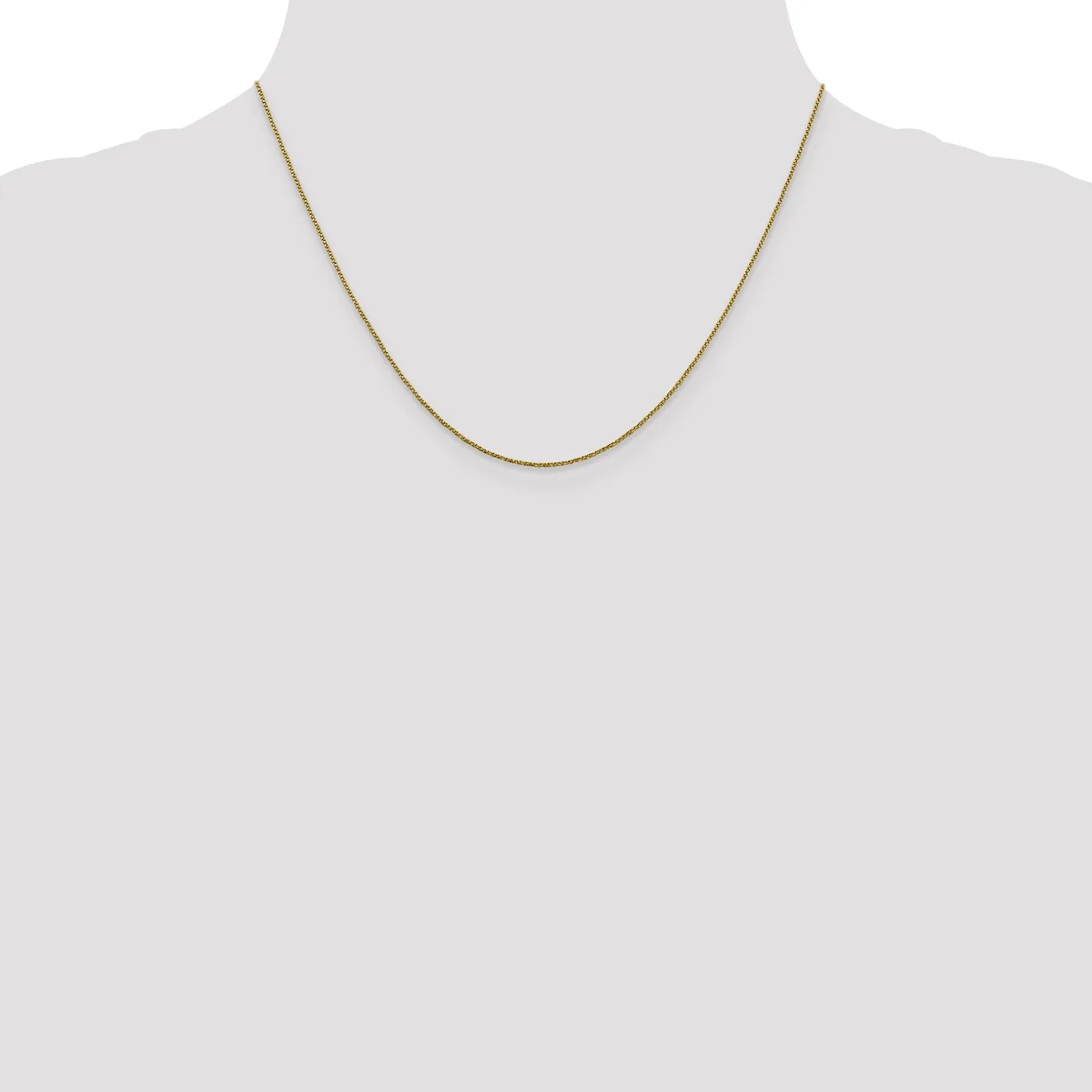 A thin gold-toned chain necklace displayed on a mannequin bust against a white background.