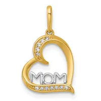 A gold heart-shaped pendant with diamond accents along the curves and the word "MOM" in silver at the center, suspended from a gold bail.