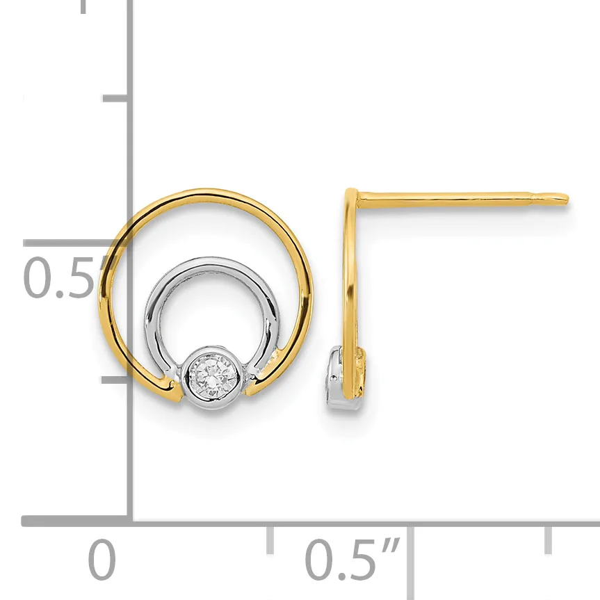 Two-tone gold and silver circular earrings with bezel-set diamonds, shown next to a ruler for scale.