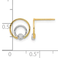 Two-tone gold and silver circular earrings with bezel-set diamonds, shown next to a ruler for scale.