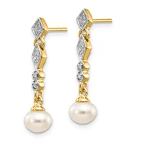 Pair of gold and diamond drop earrings with pearl dangles, shown from the front against a white background.
